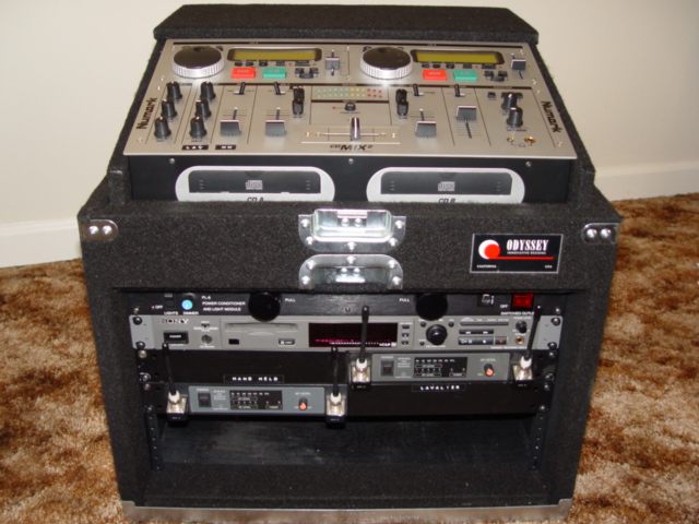 This system is used for Ceremonies,and includes: Dual CD Players, 1 Mini Disc Player, 1 Hand Held Mic & 1 lavalier Mic